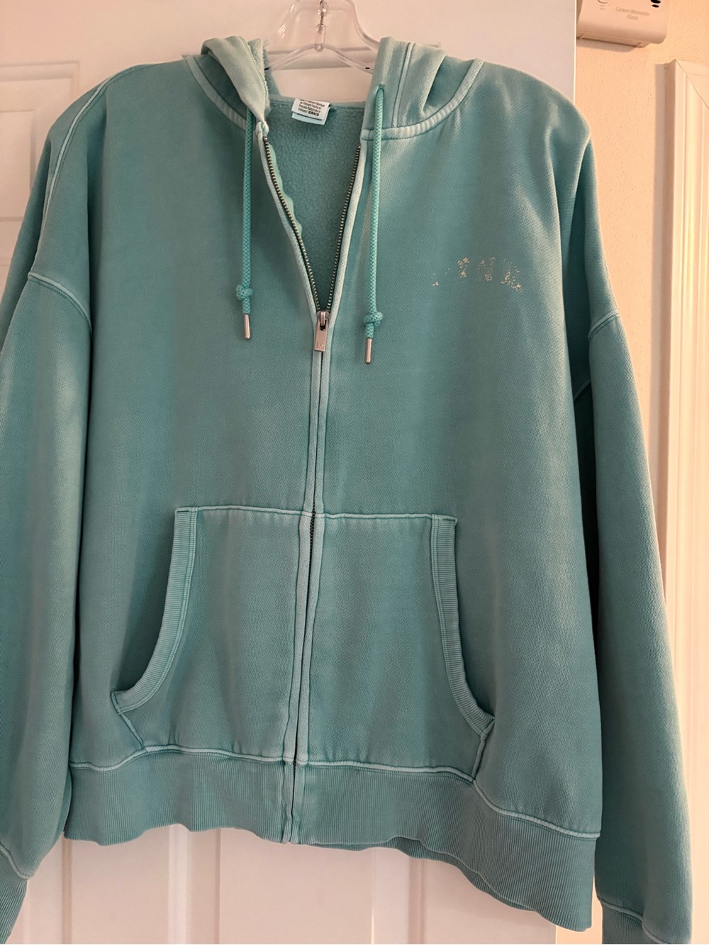 Teal Zip-Up Hoodie with Embroidered Detail